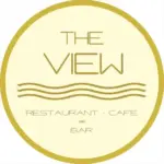 Ein kreisförmiges Logo mit goldener Umrandung zeigt den Text THE VIEW über drei gewellten goldenen Linien. Darunter steht RESTAURANT - CAFE und BAR in Gold auf einem hellen cremefarbenen Hintergrund.